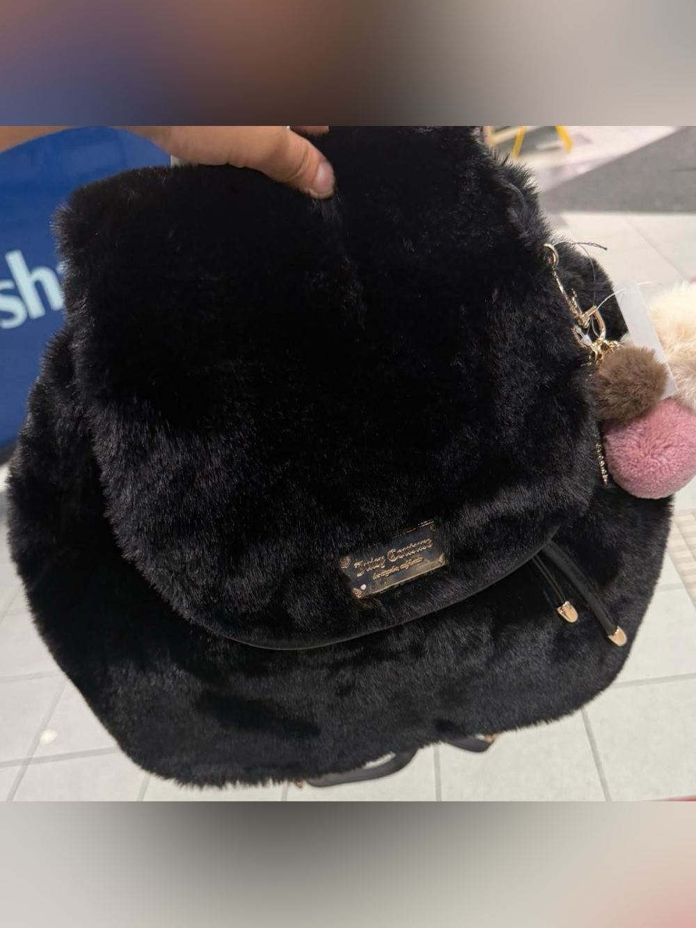 Juicy Couture Dreamy Divas black faux fur backpack with drawstring closure